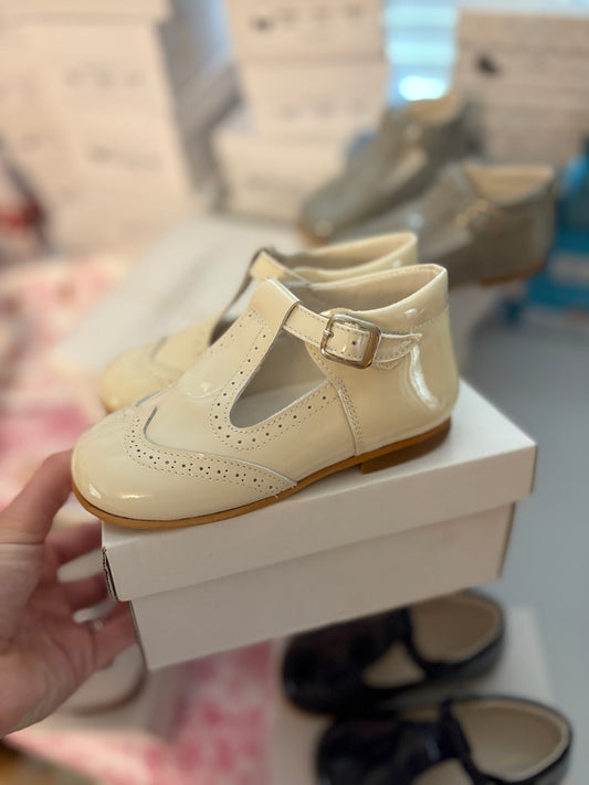 Cream patent t bar