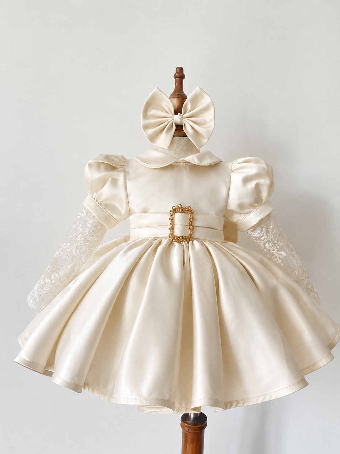 Cream classic dress with gold buckle lace details