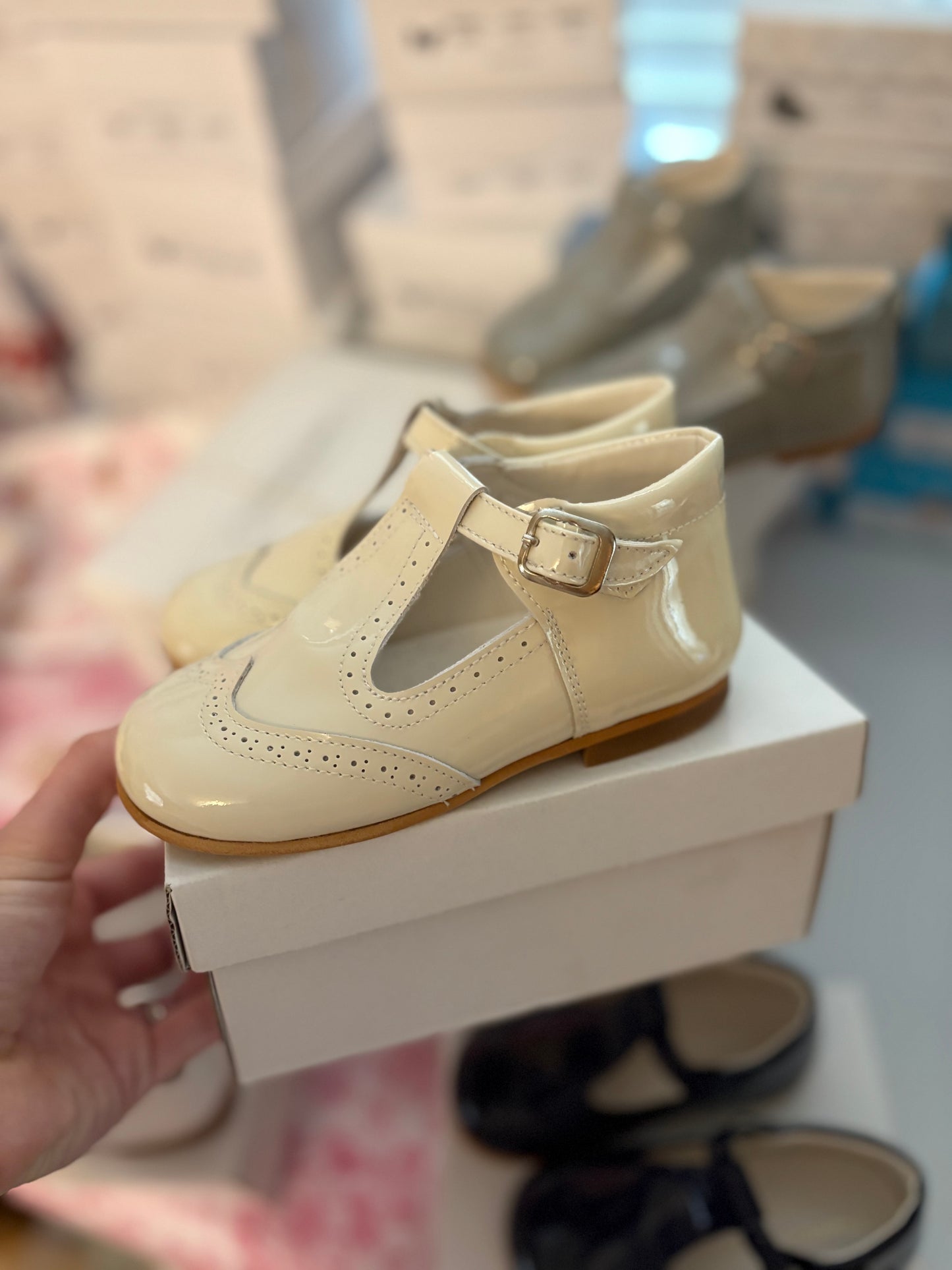 Cream patent t bar